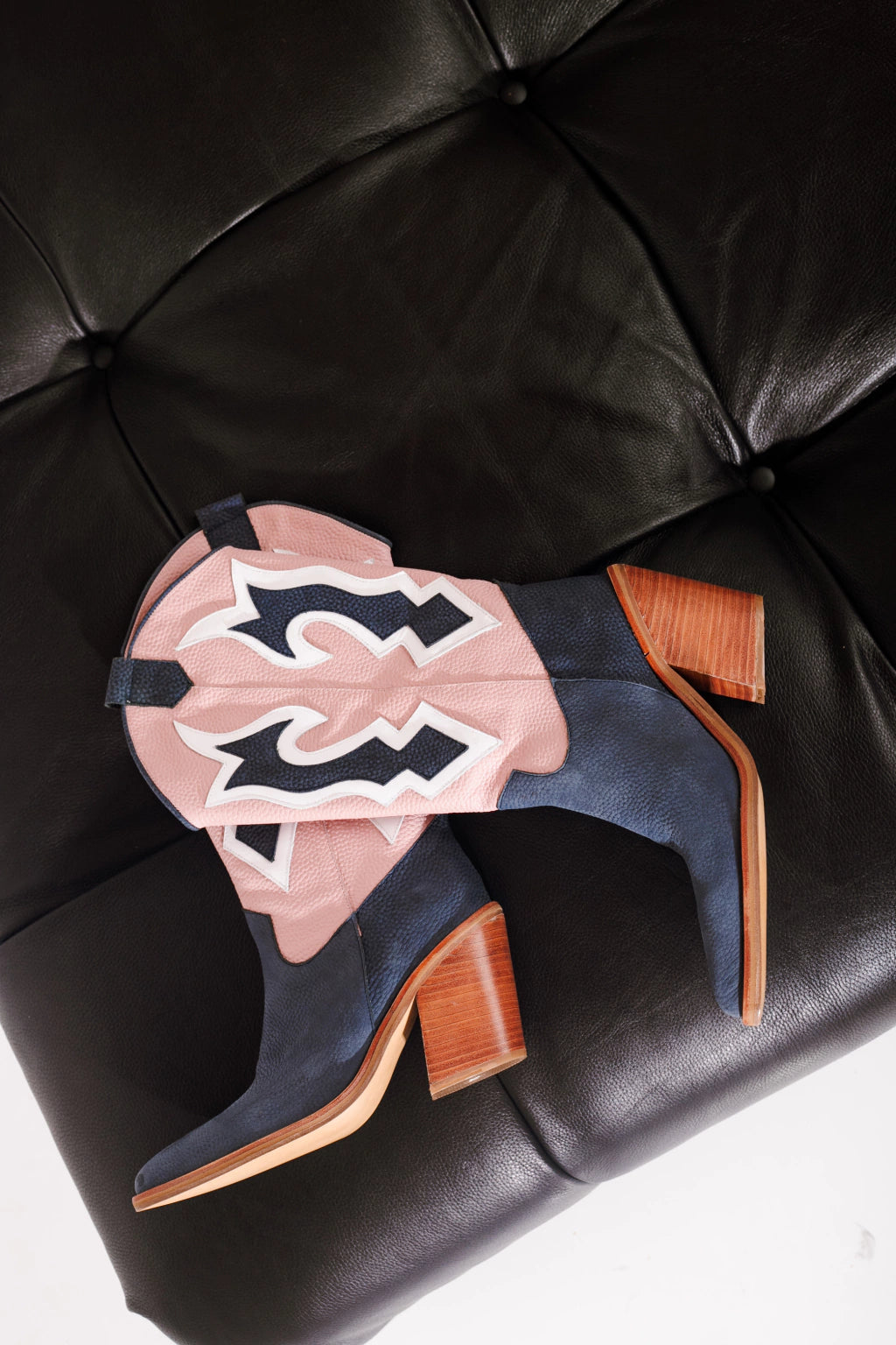 stylish high-heeled western cowboy boots for women colorful cowgirl boots, western high heel boots, modern cowboy boots for women, or statement leather boots.