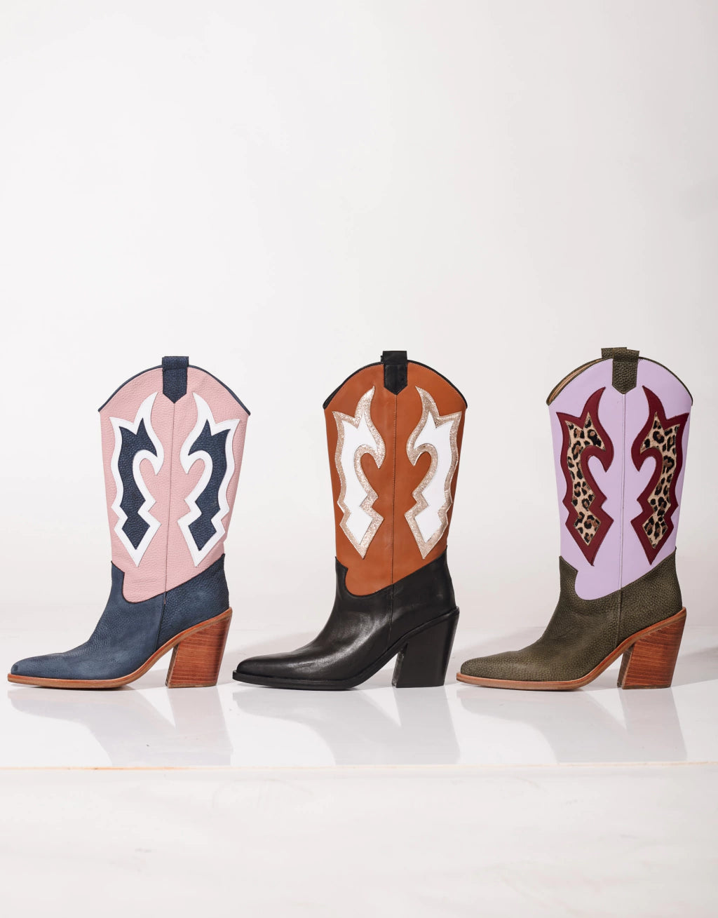 stylish high-heeled western cowboy boots for women colorful cowgirl boots, western high heel boots, modern cowboy boots for women, or statement leather boots.